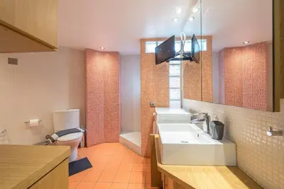 a bathroom with a sink and a toilet at Agios Ioannis Metro station - Comfy Apartment in Athens