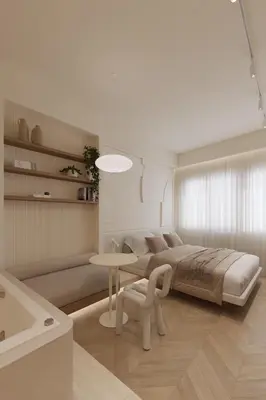 a white bedroom with a bed and a table at Luxury Living-Suite 1 in Athens