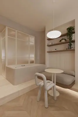a room with a table and a chair and a tub at Luxury Living-Suite 1 in Athens