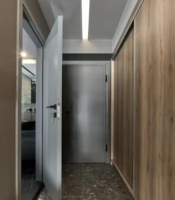 a hallway with a door and a skylight at Live in Athens City center flat in Athens