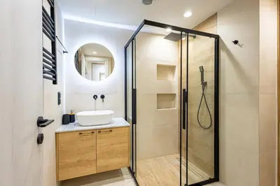 a bathroom with a sink and a shower at Stylish Central Athens Apartment in Athens