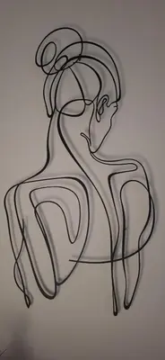 a drawing of a woman on a wall at Homy in Athens