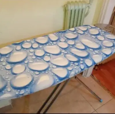 a table with blue and white plates on it at Simple apartment in Athens