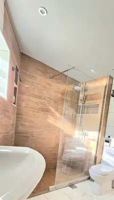 a bathroom with a shower and a toilet at Διαμέρισμα στο Χαλάνδρι in Athens
