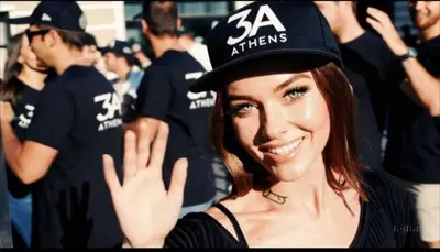 a woman wearing a hat that says at them at Triple A - Psiri Fruit Market Artistic Studios - FREE Parking in Athens