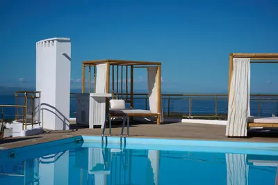 a swimming pool on the deck of a cruise ship at BlueNote Suites in Athens