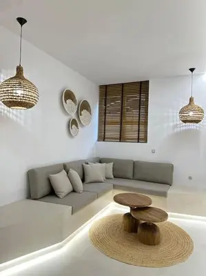 a living room with a couch and a table at Exarcheia Luxury Apartment in Athens