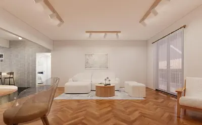 a living room with a white couch and a table at The Acropolis Penthouse in Athens