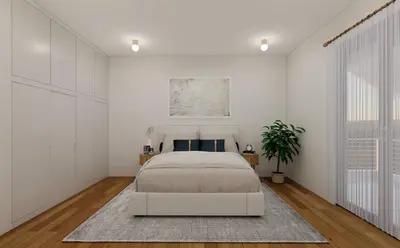 a white bedroom with a bed and a window at The Acropolis Penthouse in Athens