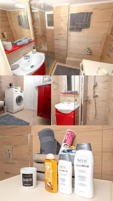 a bathroom with a sink and a toilet and towels at Summer flat by the beach&Taverna in Piraeus
