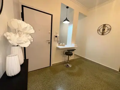 a room with a mirror and a desk and a chair at Primavera 2 bedrooms apartment in Athens