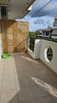 a balcony of a house with a fence at Mark1 by Apollo in Markopoulo