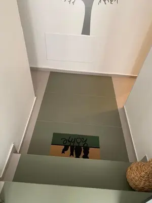 a stairway with a sign that says okay on it at ErexthionDiony2Apartments in Athens