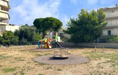 a park with a playground with a slide at Nice Apartment In Anavissos With Wifi in Anavissos