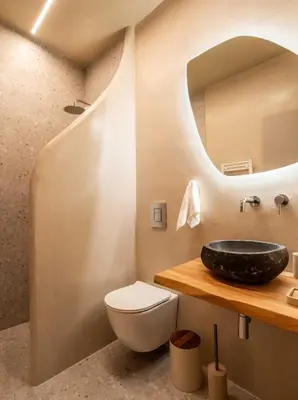 a bathroom with a sink and a toilet at Gaia Nest in Piraeus