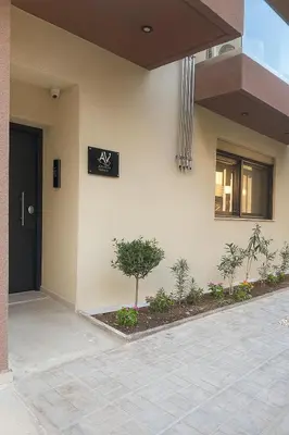 a house with a sign on the side of it at ATHENIAN Vibes in Athens