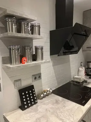 a kitchen with a counter with a stove top oven at Diamond apartment in Athens