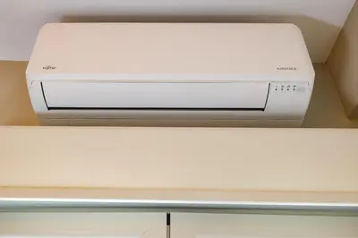 a white printer sitting on top of a shelf at Alfalfa Pagrati - Stylish Apartment near Caravel & Center in Athens