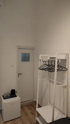 a white room with a bunk bed and a door at Marilyn Residence II in Athens