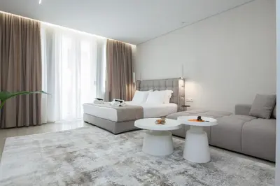 a living room with a bed and a couch at Athens Luxury center Aparts F&G in Athens