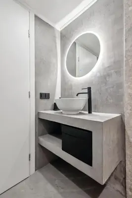 a bathroom with a sink and a mirror at Exquisite Athens Center Suite in Athens