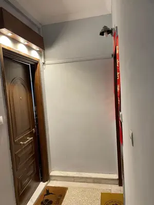 an empty room with a door and a wall at Athens Central Stay, 3BD Apartment, 3min Metro in Athens