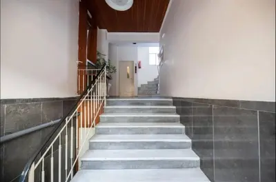 a staircase in a building with concrete steps at Acropolis Vista Retreat in Athens