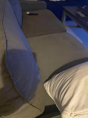 a close up of a bed with a pillow on it at Spyros apartment 2 in Athens