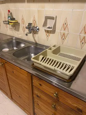 a tray sitting on a counter next to a sink at Spyros apartment 2 in Athens