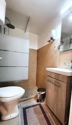 a bathroom with a toilet and a sink at Apollonas in Athens