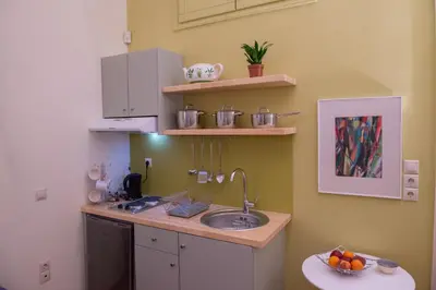 a kitchen with a sink and a counter top at Garden-studio in a mansion-Athens-Chalandri center in Athens