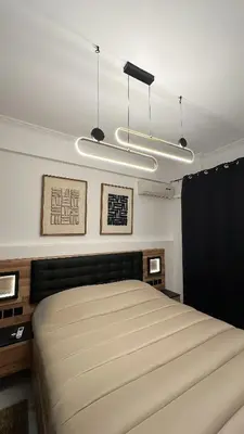 a bedroom with a large bed in a room at LIttLE PARADISE in Athens