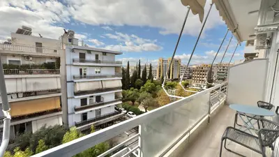 a balcony with a view of a building at Nicolas Home in Athens