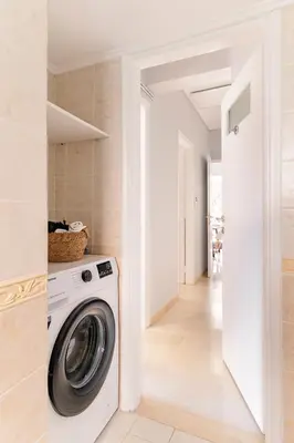 a laundry room with a washer and dryer at Eclipse Riviera Cosy in Athens