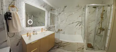 a bathroom with a shower and a sink at Little Acropolis in Athens