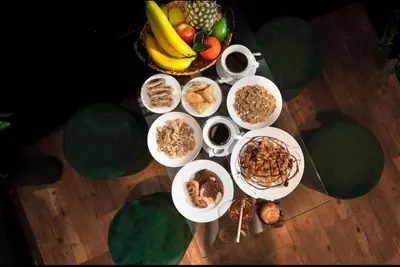a group of bowls of food on a table at Novel Acropolis Apartment in Athens