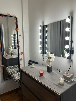 a dressing room with a dresser and a mirror at Melody Apartment in Athens