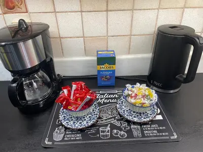 two bowls of candy on a tray on a kitchen counter at Konstantinia comfort studio in Athens