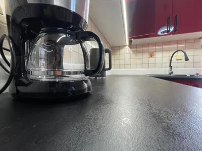 a coffee pot sitting on a counter in a kitchen at Konstantinia comfort studio in Athens