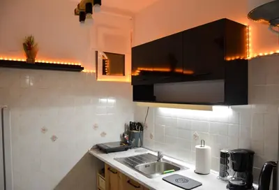 a kitchen with a sink and a counter top at Athens Boutique Home in Athens