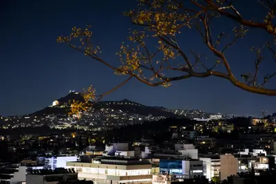 a view of a city at night at Athens Boutique Home in Athens