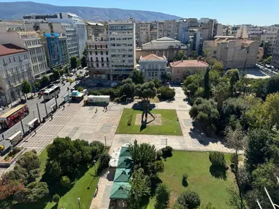 an aerial view of a city with a park at Acropolis Urban Suite Klathmonos by Zeus Suites in Athens
