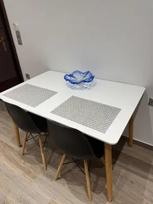 a white table with a laptop on top of it at Angel Home in Athens