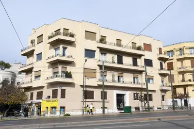 a building on the side of a street at Adrianos Gate View Apartment in Athens