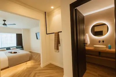 a hotel room with a bed and a sink at Triple A - Psiri Urban Glow Studios at Theatrou Square II Free Parking! in Athens