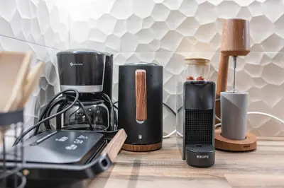 a group of appliances sitting on a table at Stylish Koukaki Retreat by the Acropolis in Athens