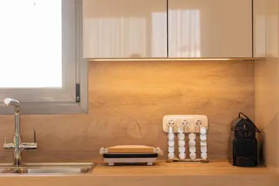 a kitchen counter with a toaster and a sink at The Mint House - Alimos in Athens