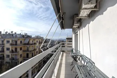 a balcony with a view of a city at Home away from Home in Athens