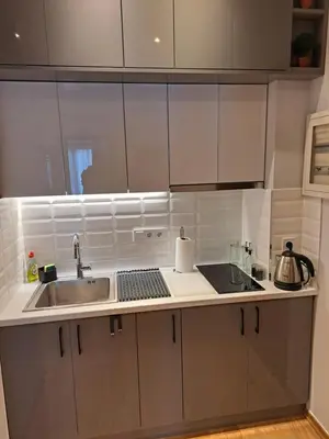 a kitchen with a sink and a counter top at TrilogyCentral in Athens