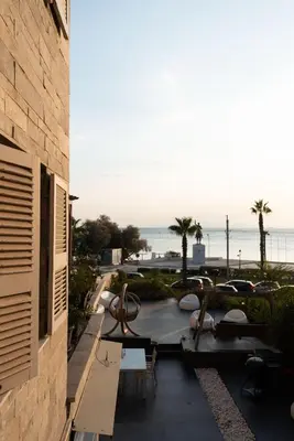 a balcony with a view of the ocean at Zeus2 Beach Front Apartment, 3BR in Athens